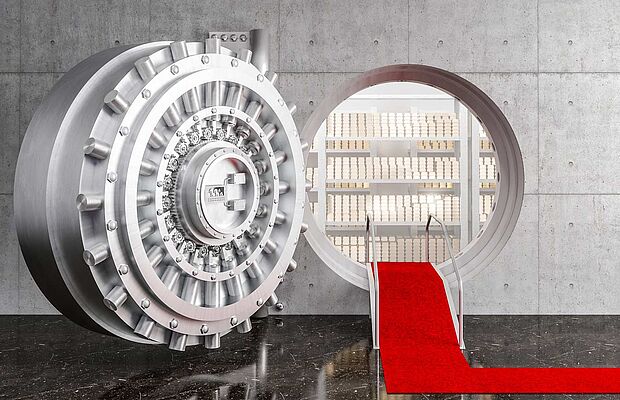 Geöffneter Goldtresor, der Zugang ist mit einem roten Teppich ausgelegt