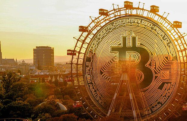 Prater mit Riesenrad, die Mitte des Riesenrades ist mit einer Bitcoin-Münze ausgefüllt