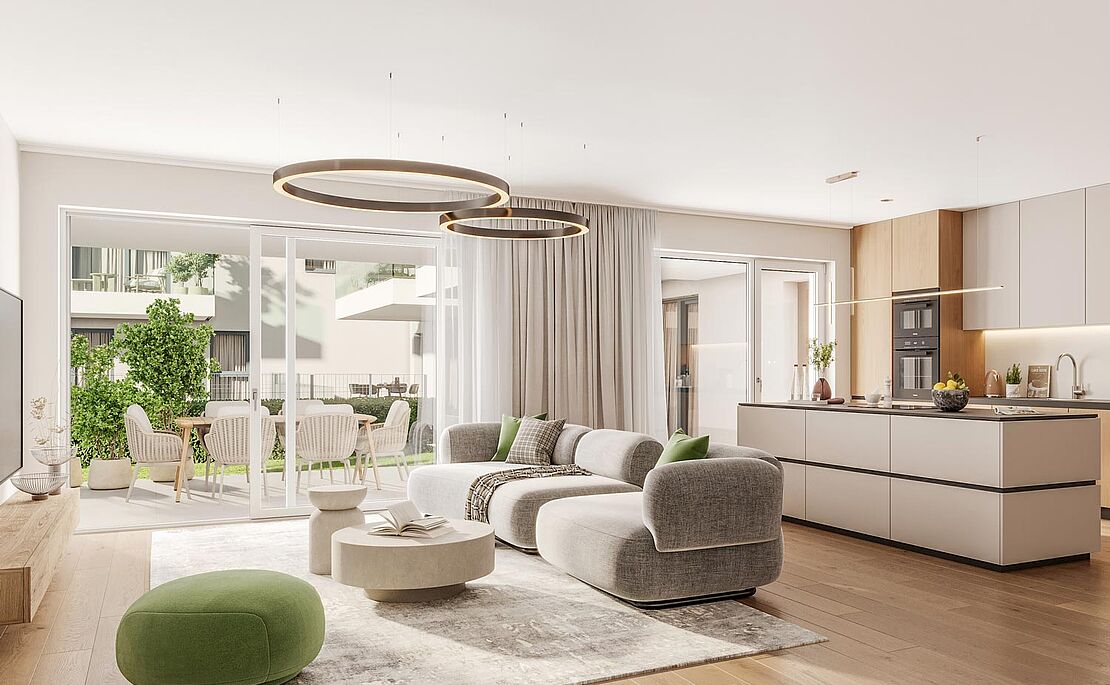 Blick in ein modernes Wohnzimmer mit offener Küche