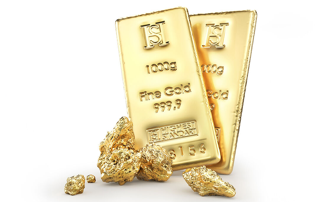 Zwei Goldbarren und ein paar Gold-Nuggets