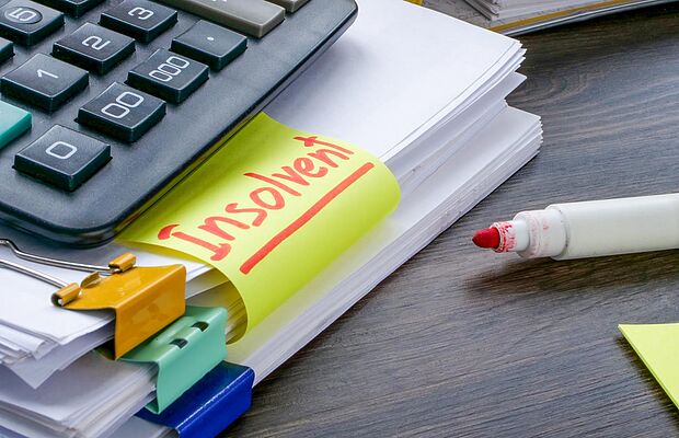 Zettel mit Post-It Insolvent