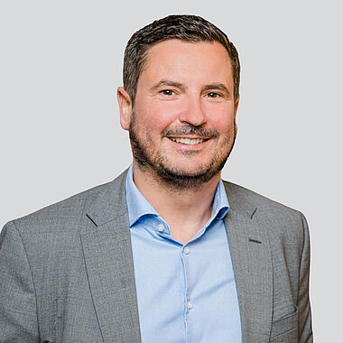 Portraitfoto Johannes Aumann