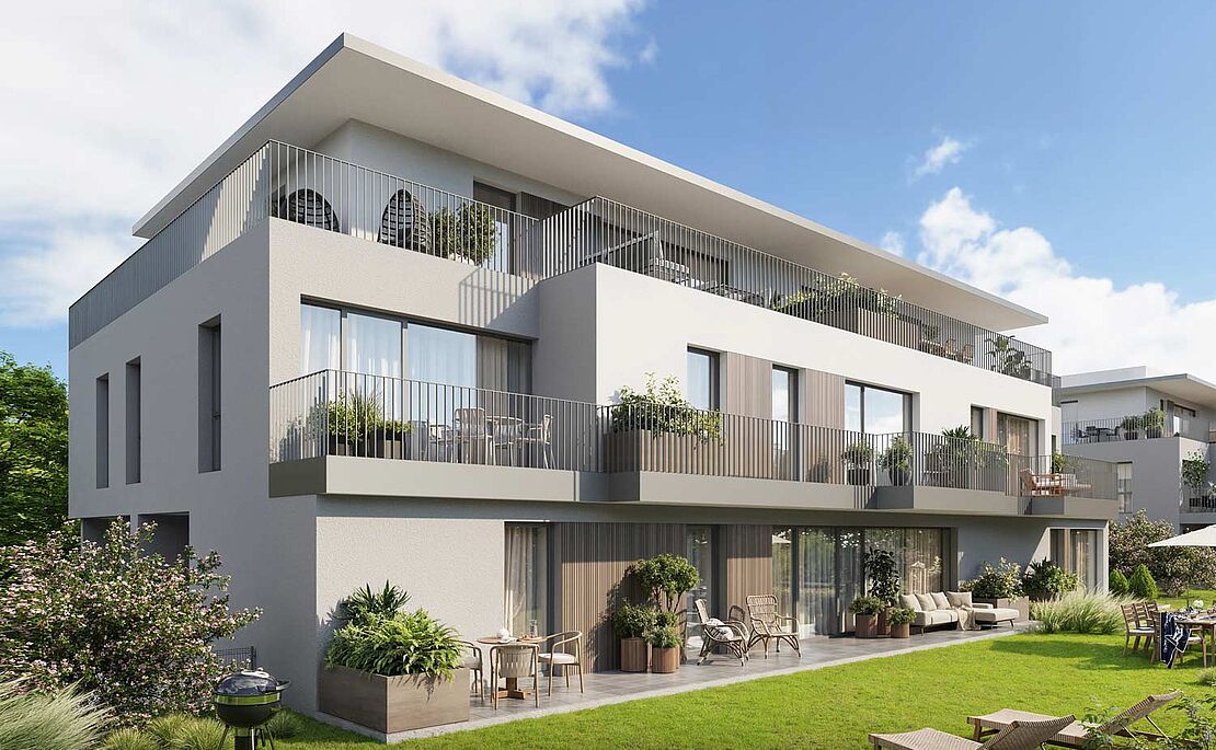 Fotomontage einer zweistöckigen Wohnhausanlage mit Gärten, Balkonen und Terrassen