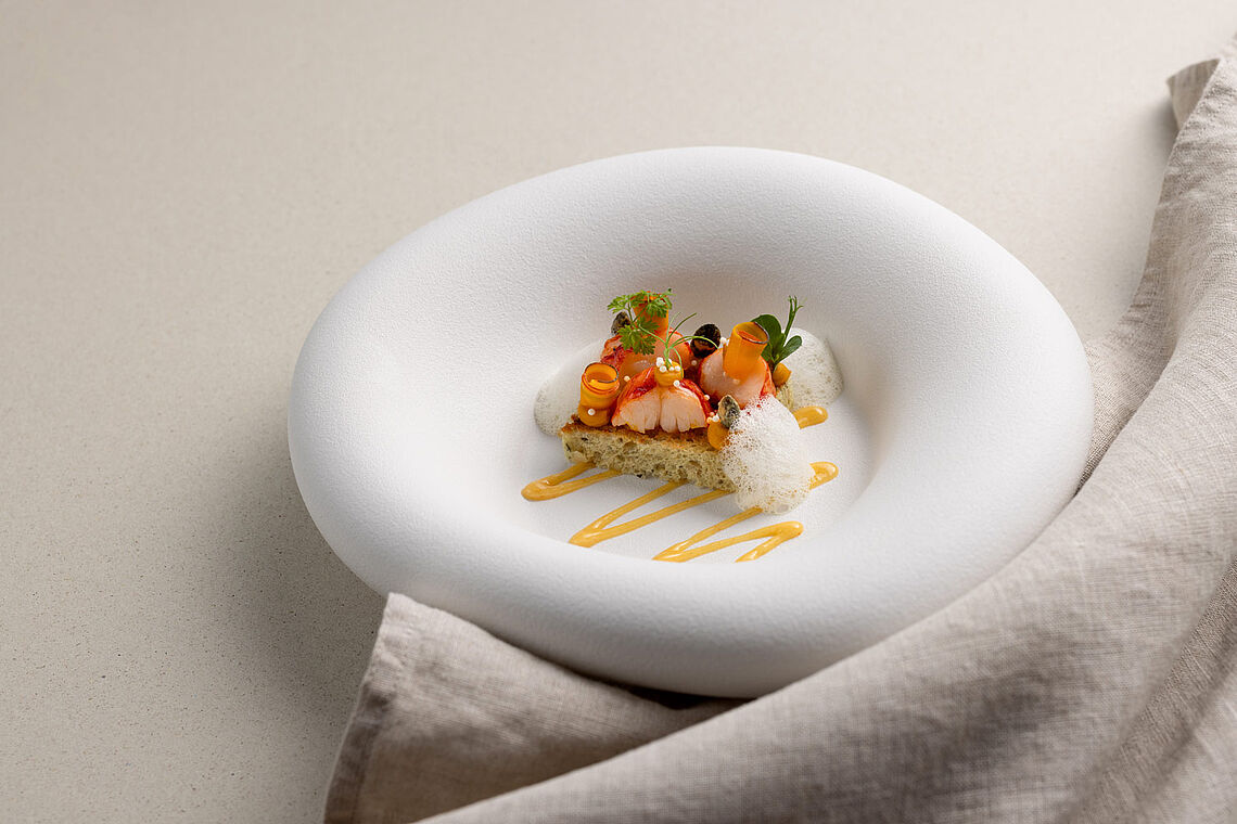 Glacierter Hummer im Gourmetrestaurant Aubergine im Hotel Vier Jahreszeiten Starnberg